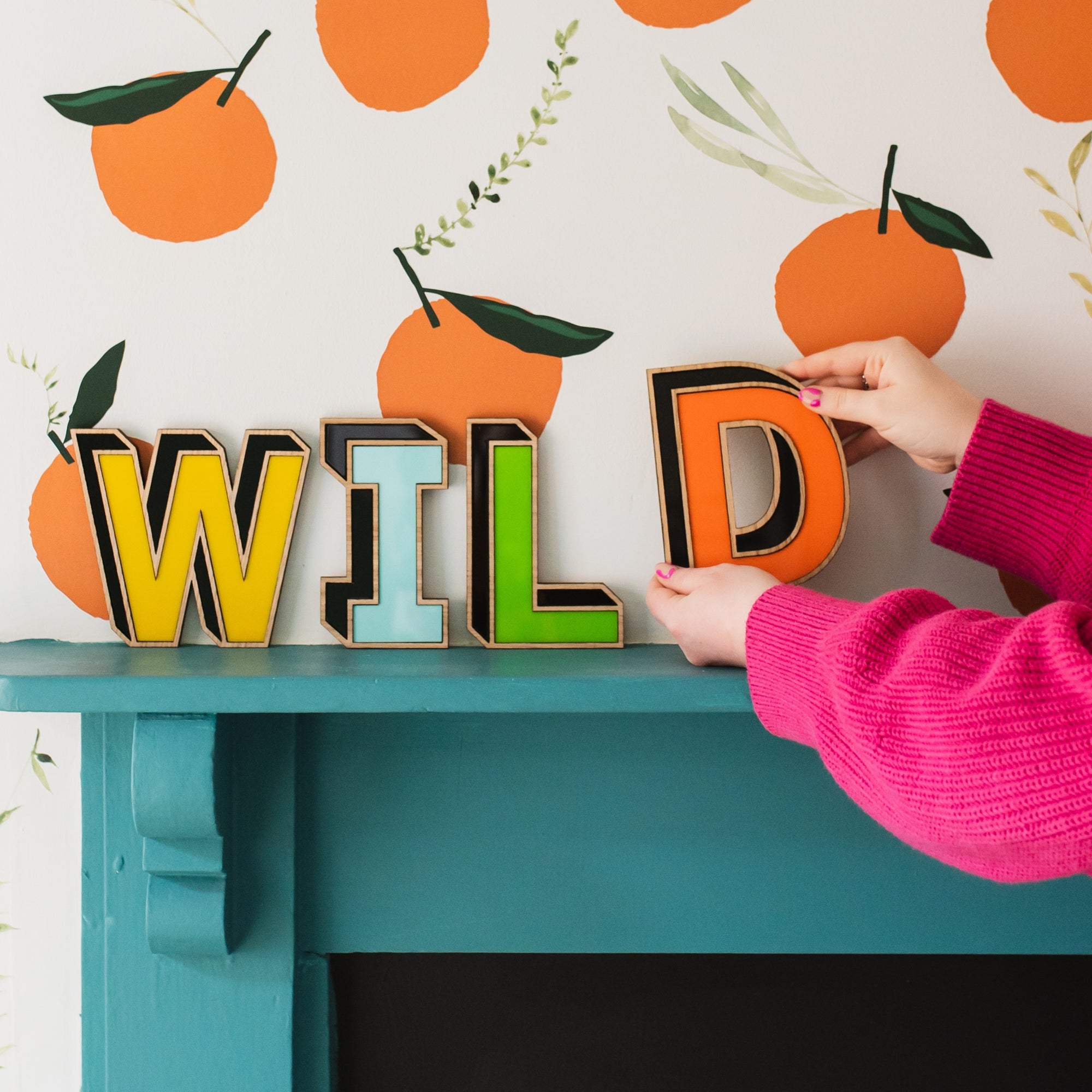 Colourful decorative letter signs in a boys bedroom